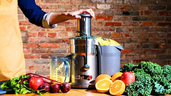 what is a masticating juicer machine
