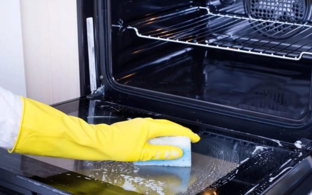 Can I use oven cleaner in a self-cleaning oven?