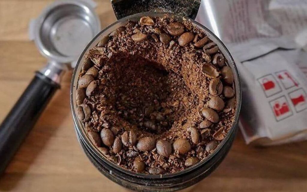 What is the best way to grind coffee beans in a food processor?